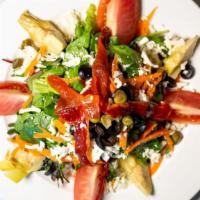 Insalata San Remo · Mixed greens, fresh mozzarella, stem tomatoes, roasted peppers, black olives, capers, and ar...