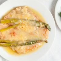 Pollo San Remo · Breast of chicken dipped in eggs and Parmesan cheese sautéed in a lemon white wine sauce top...