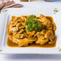 Pollo Marsala · Breast of chicken sautéed with mushrooms in marsala wine sauce.