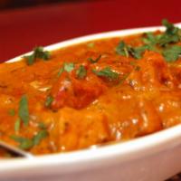Butter Chicken · Butter chicken. Boneless chicken pieces made with butter and herbs and spices.