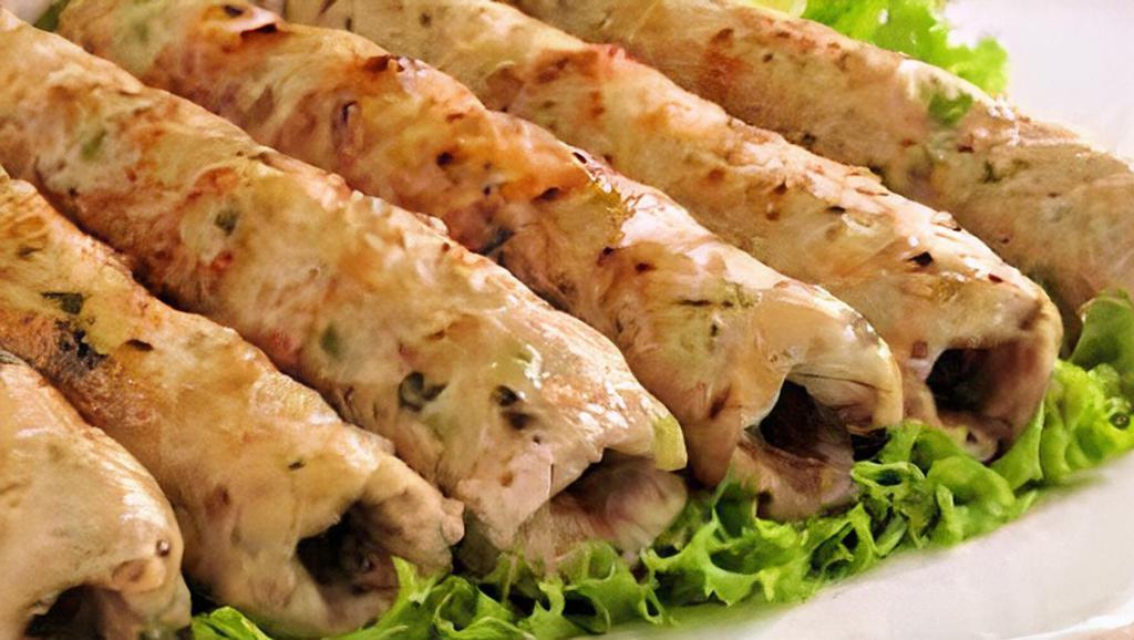 Chicken Seekh Kabab · Ground chicken keema seasoned with spices, herbs. Made fresh in a clay oven.