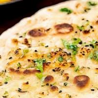 Garlic Naan · White flour bread filled with sauteed garlic and baked in clay oven.