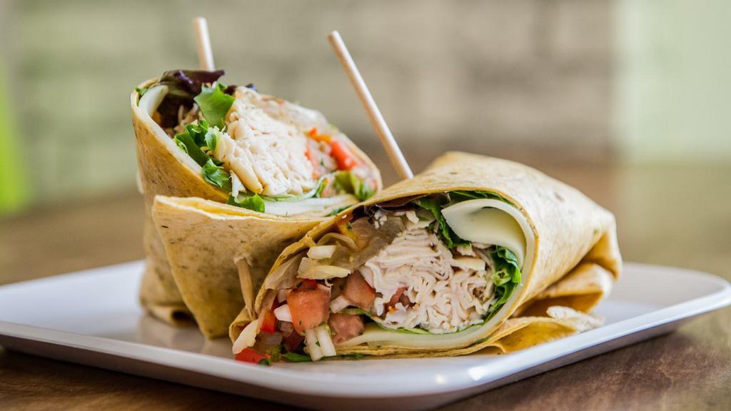 Blt Wrap · Wrap with crispy bacon, lettuce, tomatoes and your choice of bread.
