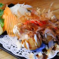 Takoyaki Plate · Battered octopus balls with bonito flakes and ginger pickles