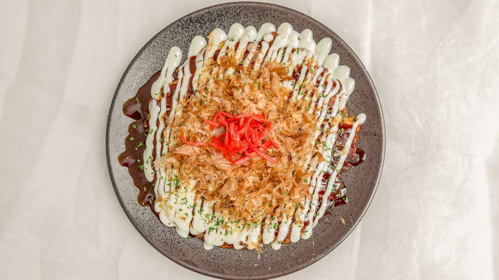 Okonomiyaki Pancake · Cabbage pancake with pork, squid, bonito flakes and ginger