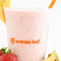 Strawberry Pina Colada Smoothie · A delicious blend of orange leaf vanilla yogurt, fresh strawberries, fresh pineapple, and fr...