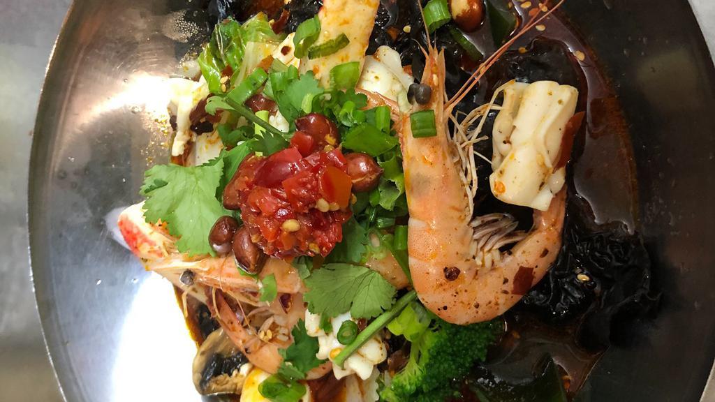 Seafood Mao Cai · Spicy. Squid, fish ball, crab stick, shrimp, bok choy, fungus, kelp, and mushrooms.