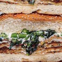 Honey Eggplant Sandwich · Fried eggplant, broccoli rabe, burrata and spicy honey on a seeded roll.