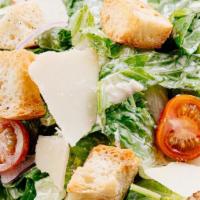Caesar Salad · Romaine, red onions, cherry tomatoes croutons, parmigiano-reggiano dressing.