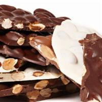 Almond Bark  (1 Lb. Box) · Freshly roasted almonds are mixed with our rich premium chocolate to create these popular an...