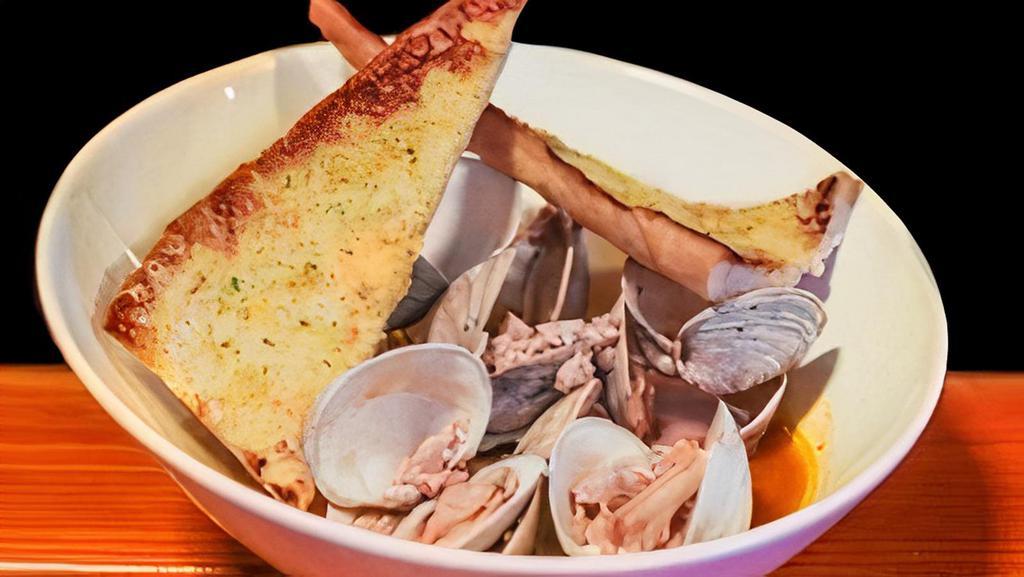Drunken Clams  · a dozen sauteed littleneck clams in a white wine sauce & a splash of housemade marinara