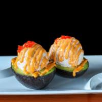 Avocado Boat · Ripe avocado halves topped with crab salad, spicy mayonnaise, and masago