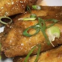 Proper Wings · Choice of: classic buffalo, Korean BBQ, sweet chili, zip zip, or featured sauce.