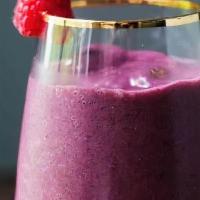 Acai Smoothie · Acai smoothie blended with almond milk and bananas.