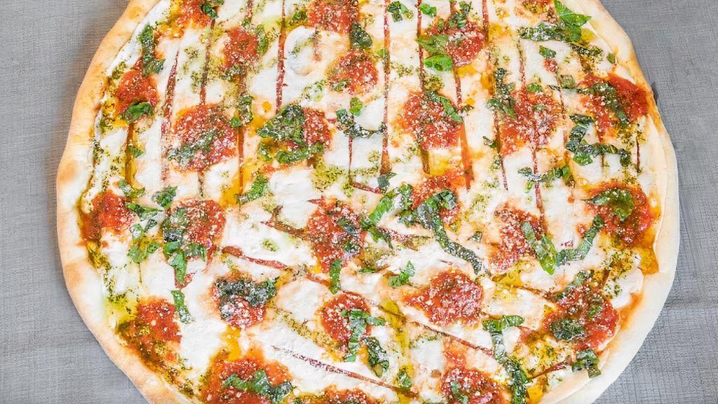 Margherita Pizza · Mozzarella cheese, basil, tomatoes and tomato sauce.