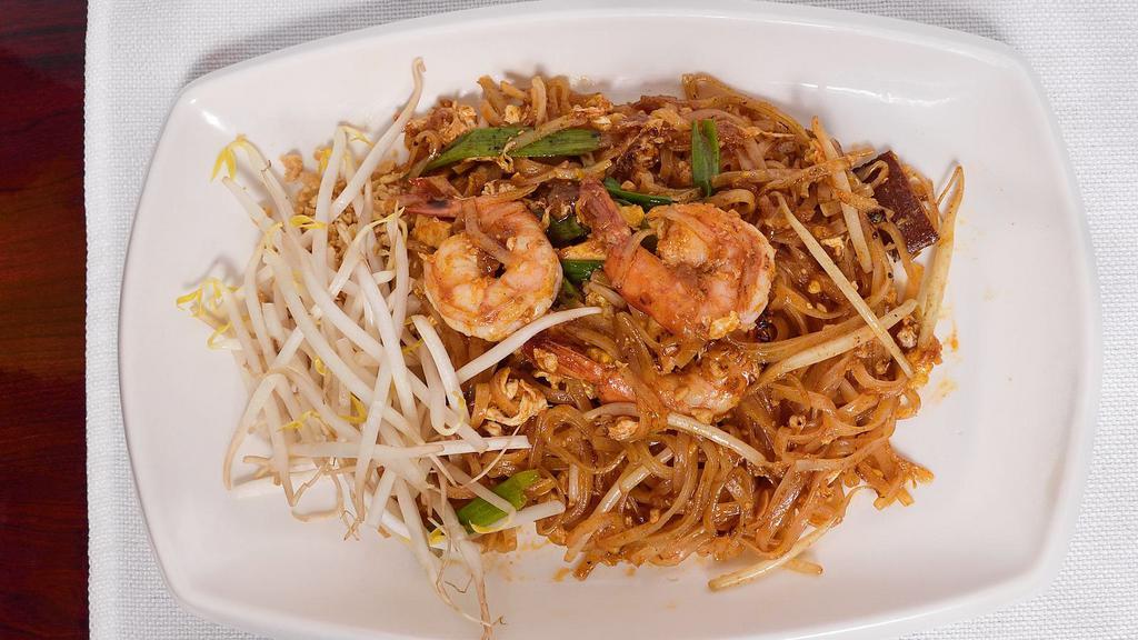 Pad Thai · Stir fried rice noodle with egg, scallion, bean sprout and crushed peanut.