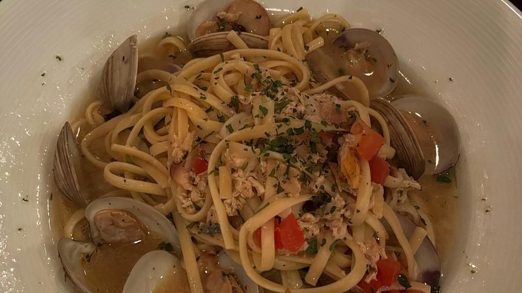 Linguine Vongole · With garlic, white wine, fresh tomatoes, and little neck clams.