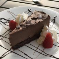 Chocolate Mousse Cake · Topped with dark chocolate ganache.