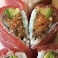 Sweet Heart Roll · Spicy. Crunchy spicy tuna and avocado topped with fresh tuna.