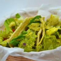 Guacamole Taco (4) · Guacamole, pico de gallo, lettuce and green sauce.