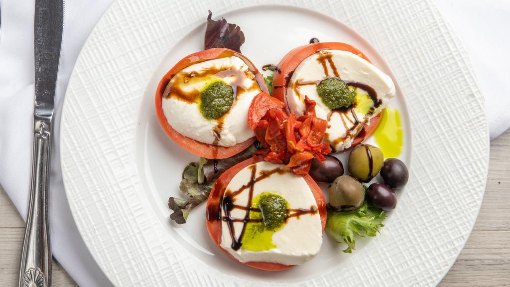 Tomato And Mozzarella · slice tomato and fresh mozzarella basil pesto