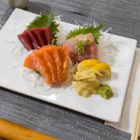 Triple Sashimi · 4 pieces each of tuna, salmon and yellowtail.