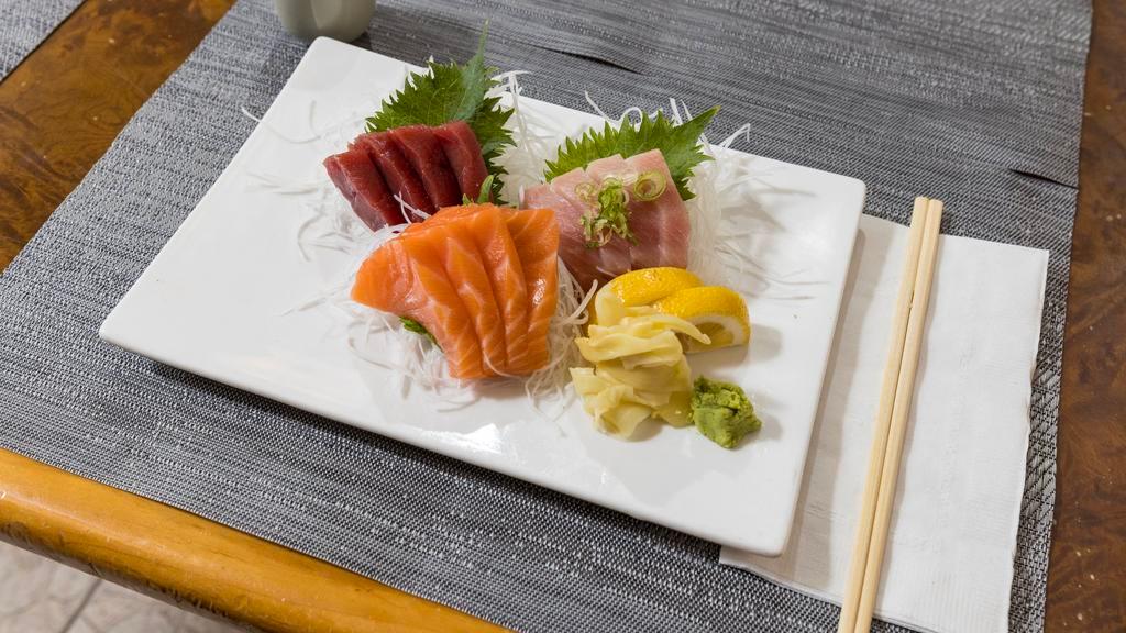 Triple Sashimi · 4 pieces each of tuna, salmon and yellowtail.