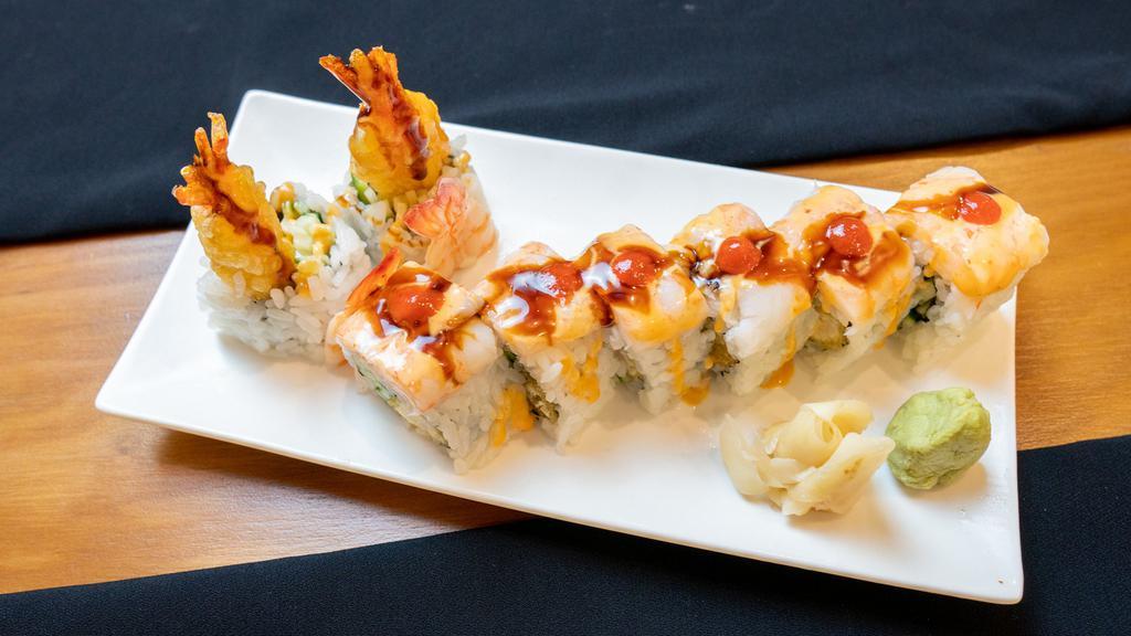 Rock Shrimp Roll · Shrimp Tempura w/ Cucumber Inside. Topped with Sushi Shrimp, Sriracha, Spicy Mayo & Sweet Shoyu.