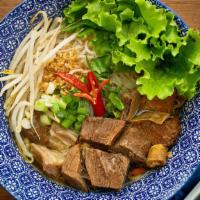 Beef Noodle Soup · Double braised beef shank in an infused Chinese herbs & spices broth, leaf lettuce, bean spr...