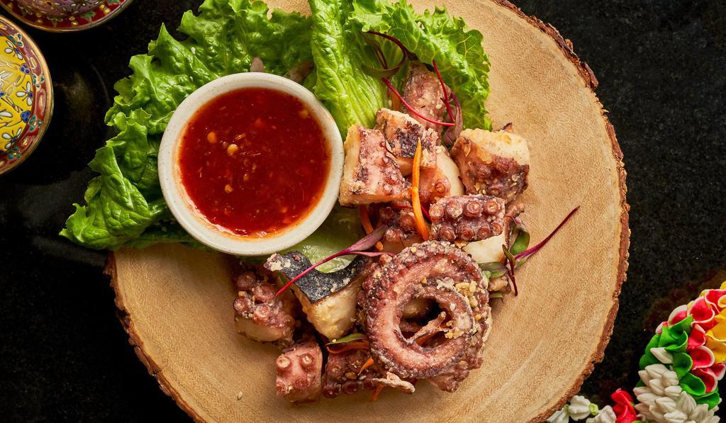 Crispy Octopus (85G.) · Crispy Octopus, perfectly seasoned. Served with a sweet chili sauce and homemade Thai sriracha mayo .