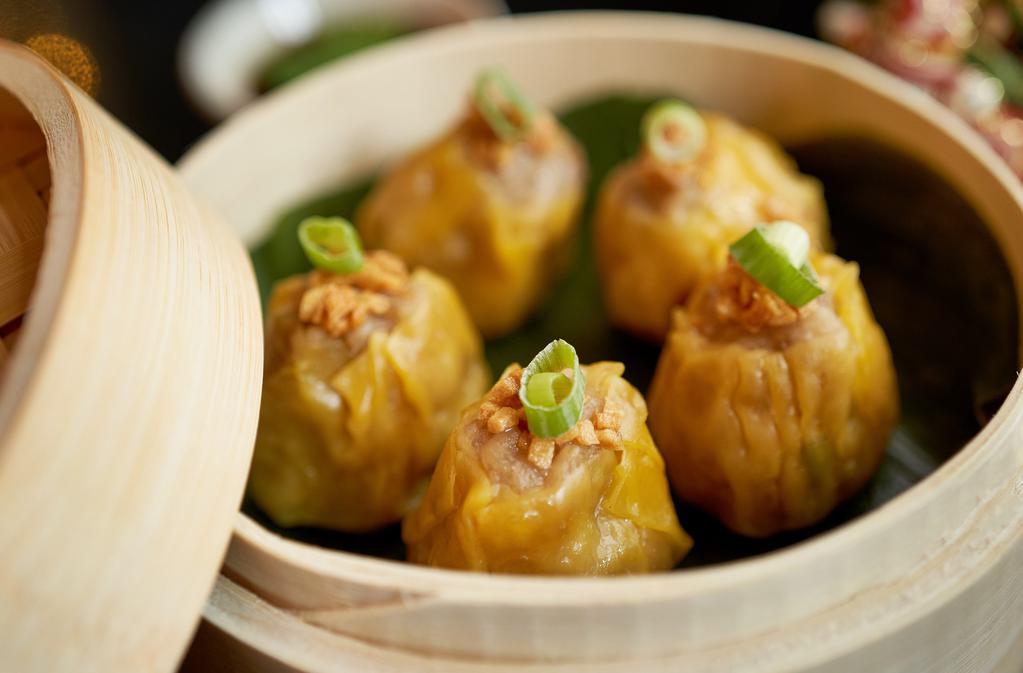 Kanom Jeep (5Pcs) · Homemade chicken shumai. Served steamed or fried with a citrus champagne soy sauce vinaigrette.