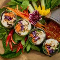Lui Suan · Gluten Free. Elegant Thai-style garden wrap filled with sauté minced chicken or shrimp, fres...