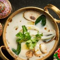 Tom Kha Soup · Gluten Free. Classic coconut soup infused with lemon grass, galangals, kaffir lime leaves wi...