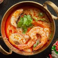 Tom-Yum Soup (Large) · Gluten Free. Classic Thai spicy and sour soup with lemongrass, chili, cilantro, onion, milk,...