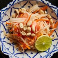 Som Tum Thai · Gluten-Free. Fresh shredded green papaya, tomato and peanuts with lime dressing.