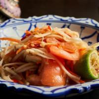 Som Tum Laos · Gluten-Free. Green papaya salad, tomato and Laos style anchovy dressing.