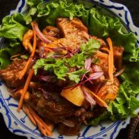 Crispy Vegetarian Duck Salad · Spicy Items. Crispy vegetarian duck, pineapple, cashew nuts and smoked chili paste dressed i...