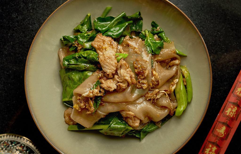 Pad See Ew · Stir-fry flat rice noodles with egg and Chinese broccoli in Thai Sweet soy sauce.