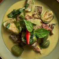 Green Curry · Gluten Free. Spicy Item. Grandma’s recipe. Green curry with Thai eggplant, coconut milk, bel...