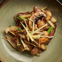 Pad Khing · Stir fry with fresh ginger, carrot, scallion, onion, mushroom in fresh ginger sauce. Served ...