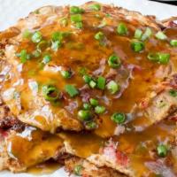 Roast Pork Egg Foo Young · With white rice.