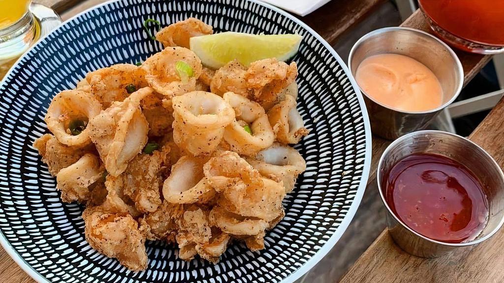 A-17 Crispy Calamari · Crispy fried calamari served with sweet chili sauce and spicy mayo. **If you need plastic utensils, please request.**