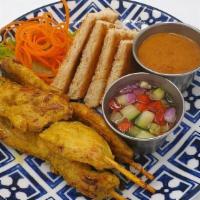 A-11 Chicken Satay · Grilled chicken skewers served with peanut sauce and cucumber relish and toast. **If you nee...