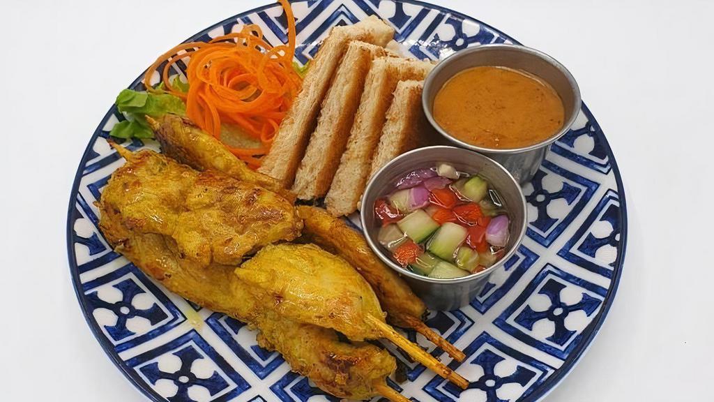 A-11 Chicken Satay · Grilled chicken skewers served with peanut sauce and cucumber relish and toast. **If you need plastic utensils, please request.**