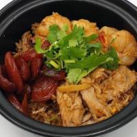 M-3 Clay Pot Rice · Rice cooked in sweet soy sauce with sweet Thai sausage, pork, shrimp, ginger, mushroom, egg,...