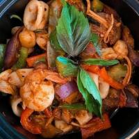 M-4 Seafood Pad Cha · Mixed seafood sautéed with bell pepper, pepper corn, finger root, Thai eggplant, in spicy ba...