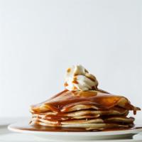 Sticky Toffee Pancakes · Delicious Pancakes cooked to perfection and topped with Toffee Syrup and Caramelized Pecans.
