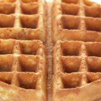 Classic Belgian Waffle · Delicious Belgian Waffle cooked to perfection and topped with Powdered Sugar, Butter, and Sy...