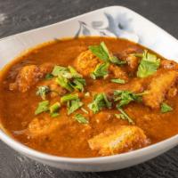 Madras Chicken Pepper Curry · Flavorful rich n spicy curry, homemade style slow cooked with cracked black pepper, yellow m...