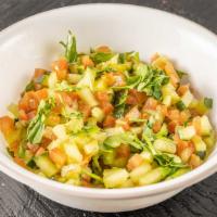 Kachumber Salad · Small. Sweet-tangy tomatoes, crunchy cucumbers and piquant onions go well with almost any In...